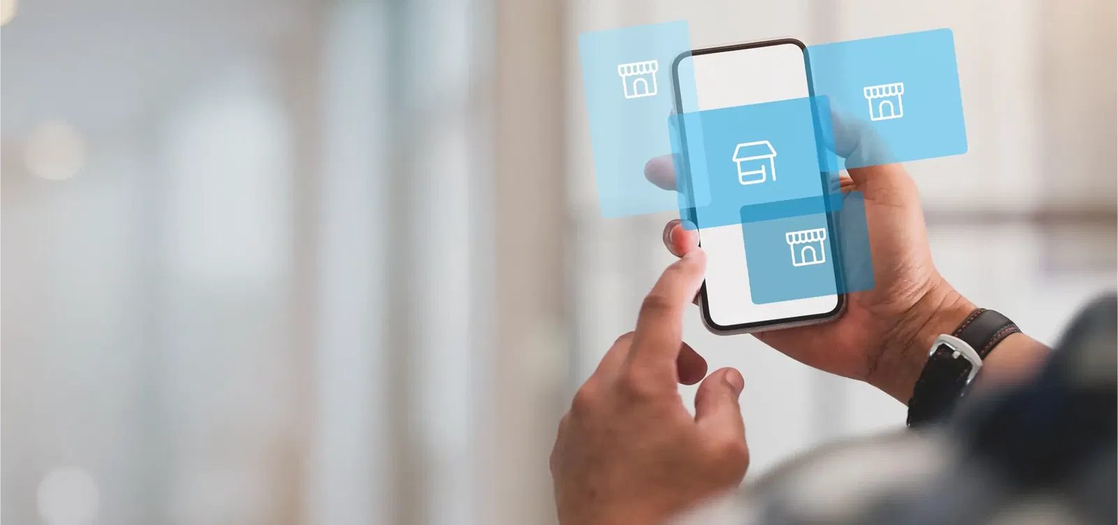 Shop-in-Shop Konzepte von elio Person nutzt ein Smartphone mit Shop-Symbolen auf dem Display – Darstellung eines Shop-in-Shop-Konzepts in einem Einzelhandelsumfeld